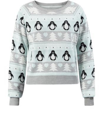 Mint green Christmas jumper with hearts, penguins and xmas trees.