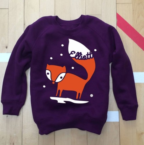 Purple personalized children's jumper featuring a fox in the snow.