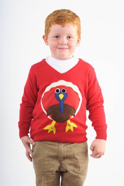 Red children's Christmas jumper with turkey design