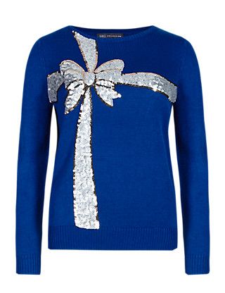 Ladies Christmas jumper with silver ribbon.