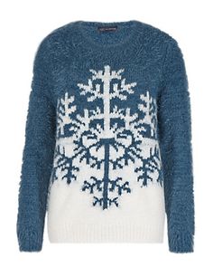 Women's Christmas jumper, blue-green with snowflake design.