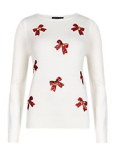 Ladies Christmas jumper with red bows and bells.