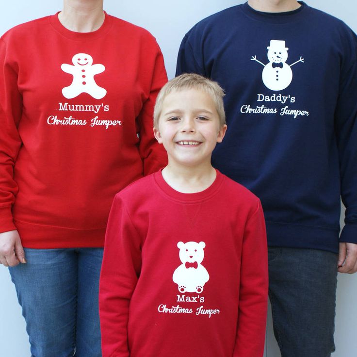 mum dad and baby matching christmas jumpers