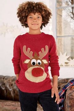 Children's Christmas jumper. Picture shoes front detail of reindeer