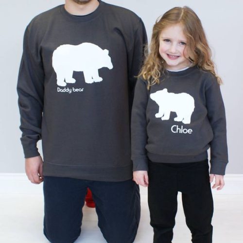 Daddy bear and baby bear matching Christmas jumpers for father and child