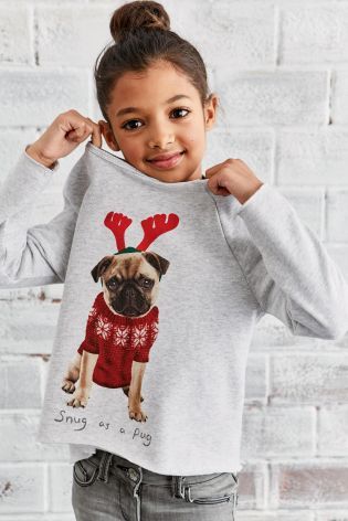 Kid's Christmas jumper with a pug dog wearing a reindeer head band
