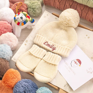 Baby’s First Christmas Personalised Cotton Bobble Hat And Mittens Gift Set from Not On The High Street