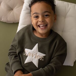 Personalised Children's Christmas Star Sweatshirt from Not On The High Street