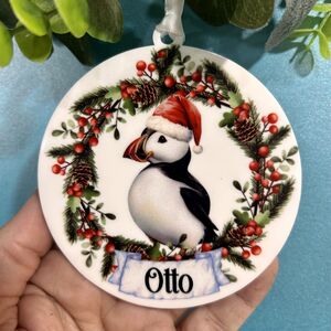 Personalised Cute Puffin Santa Hat Christmas Bauble from Not On The High Street